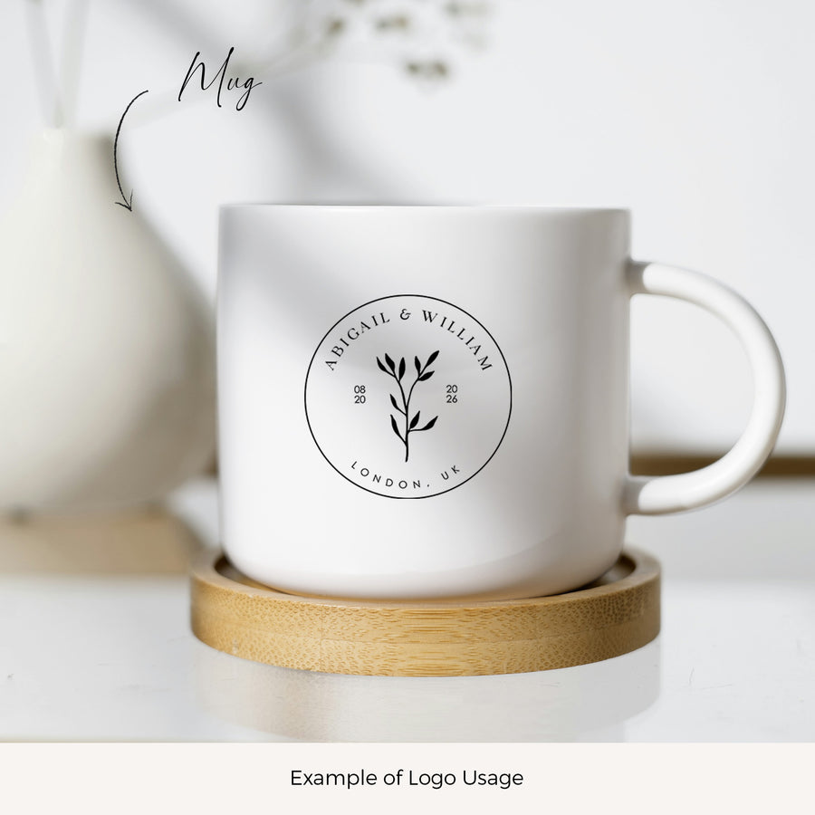 a white coffee mug sitting on top of a wooden coaster